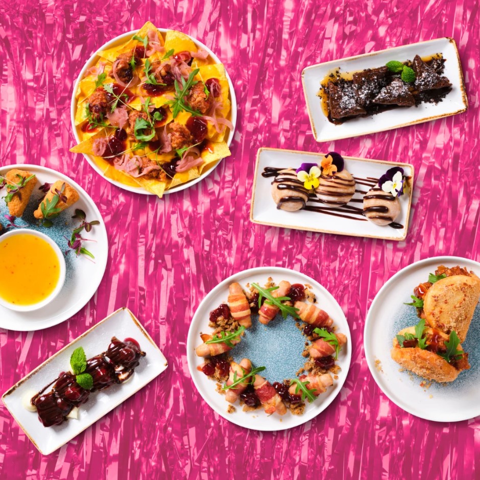 Christmas food dishes on sparkly pink background